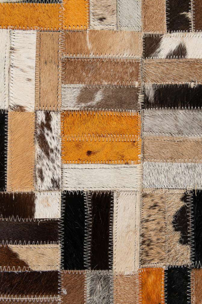 4' 11 x 7' 10 Cowhide - Patchwork Rug