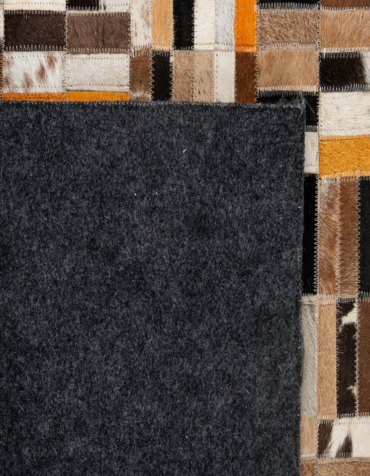 Detail image of 4' 11 x 7' 10 Cowhide - Patchwork Rug