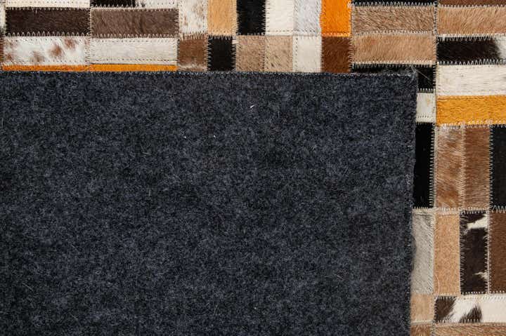 4' 11 x 7' 10 Cowhide - Patchwork Rug