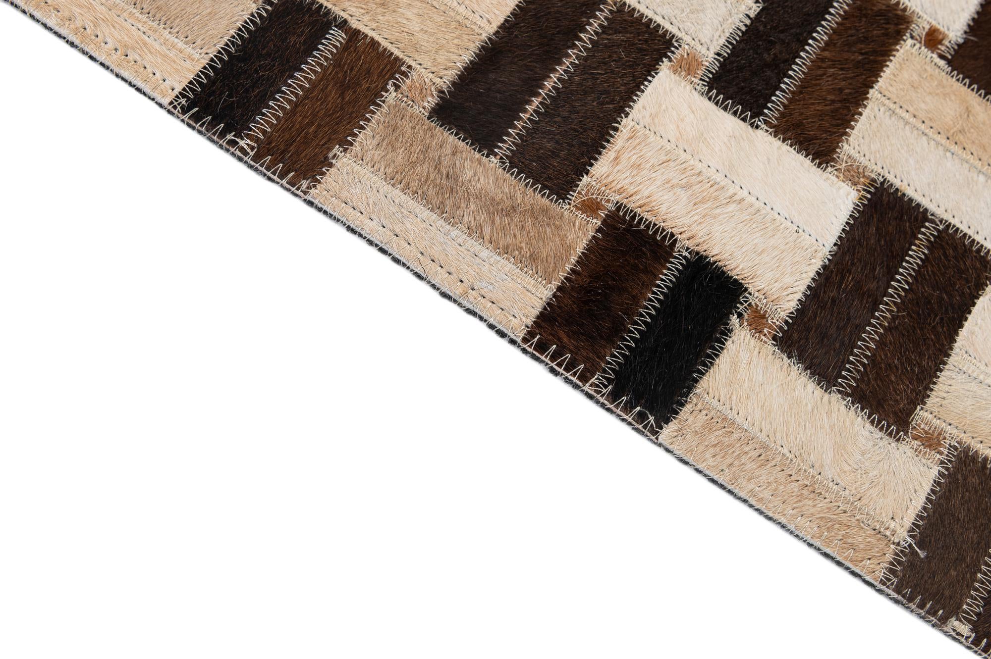 4' 11 x 7' 10 Cowhide - Patchwork Rug