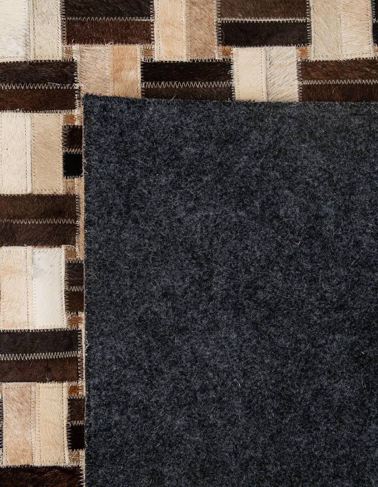 Detail image of 4' 11 x 7' 10 Cowhide - Patchwork Rug