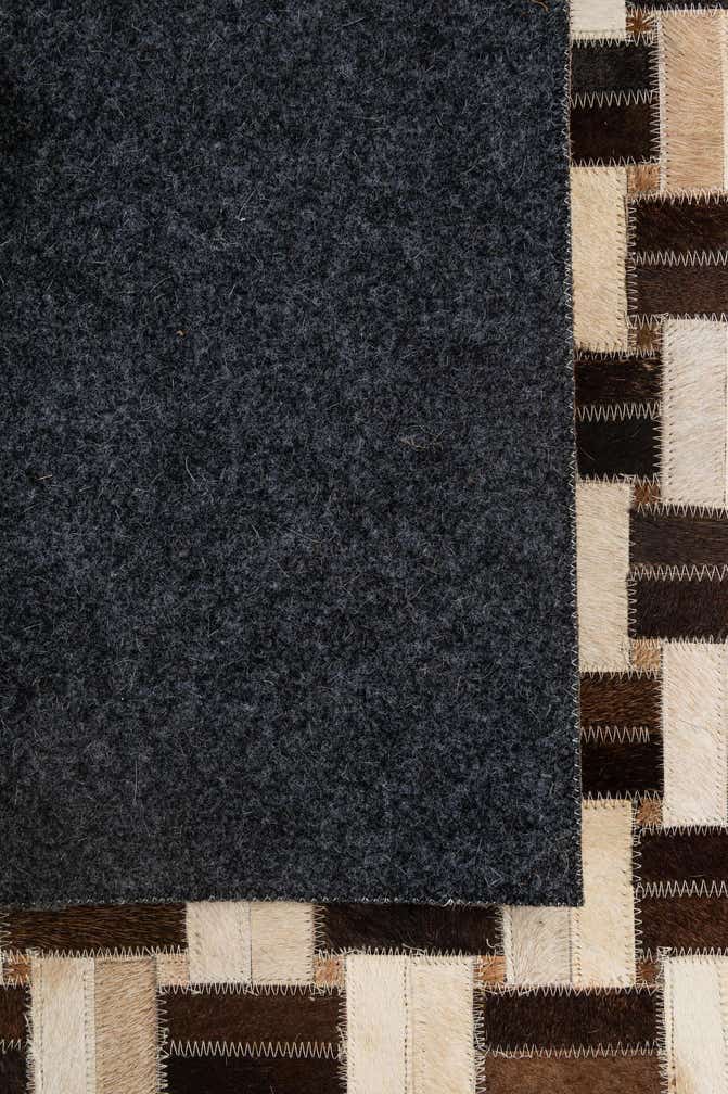 5' x 7' 9 Cowhide - Patchwork Rug