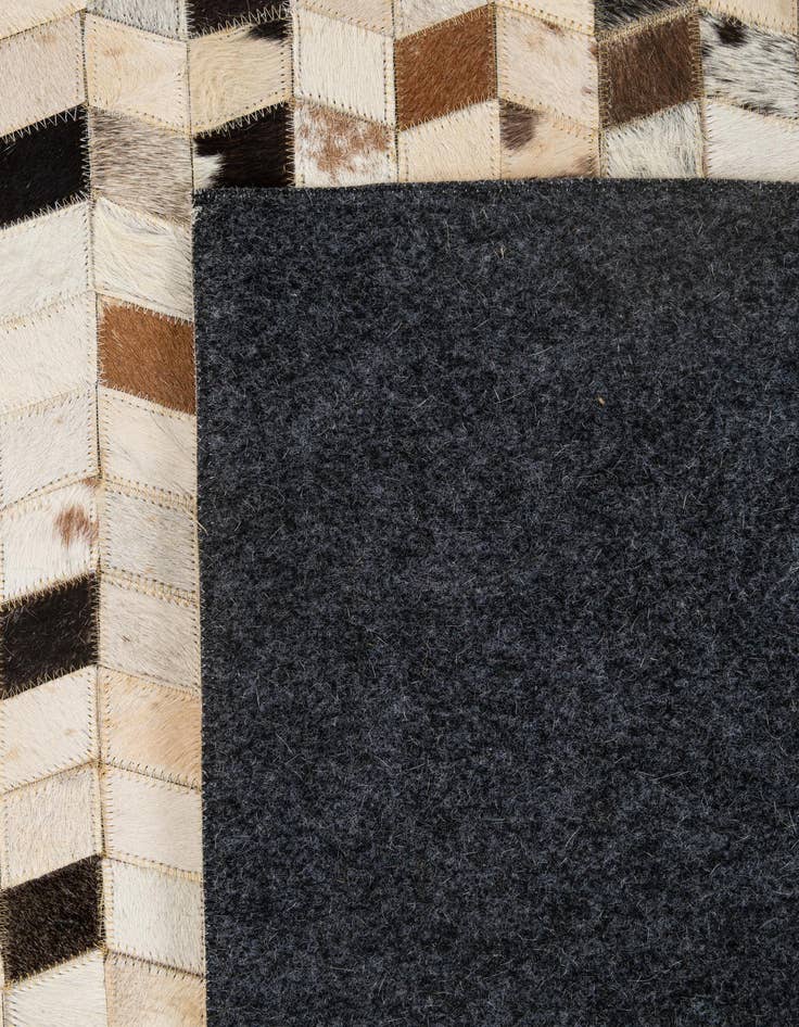 Detail image of 5' x 7' 11 Cowhide - Patchwork Rug