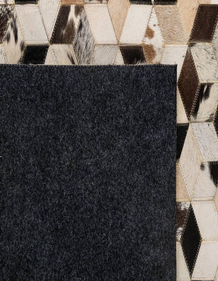 Detail image of 5' 1 x 7' 10 Cowhide - Patchwork Rug