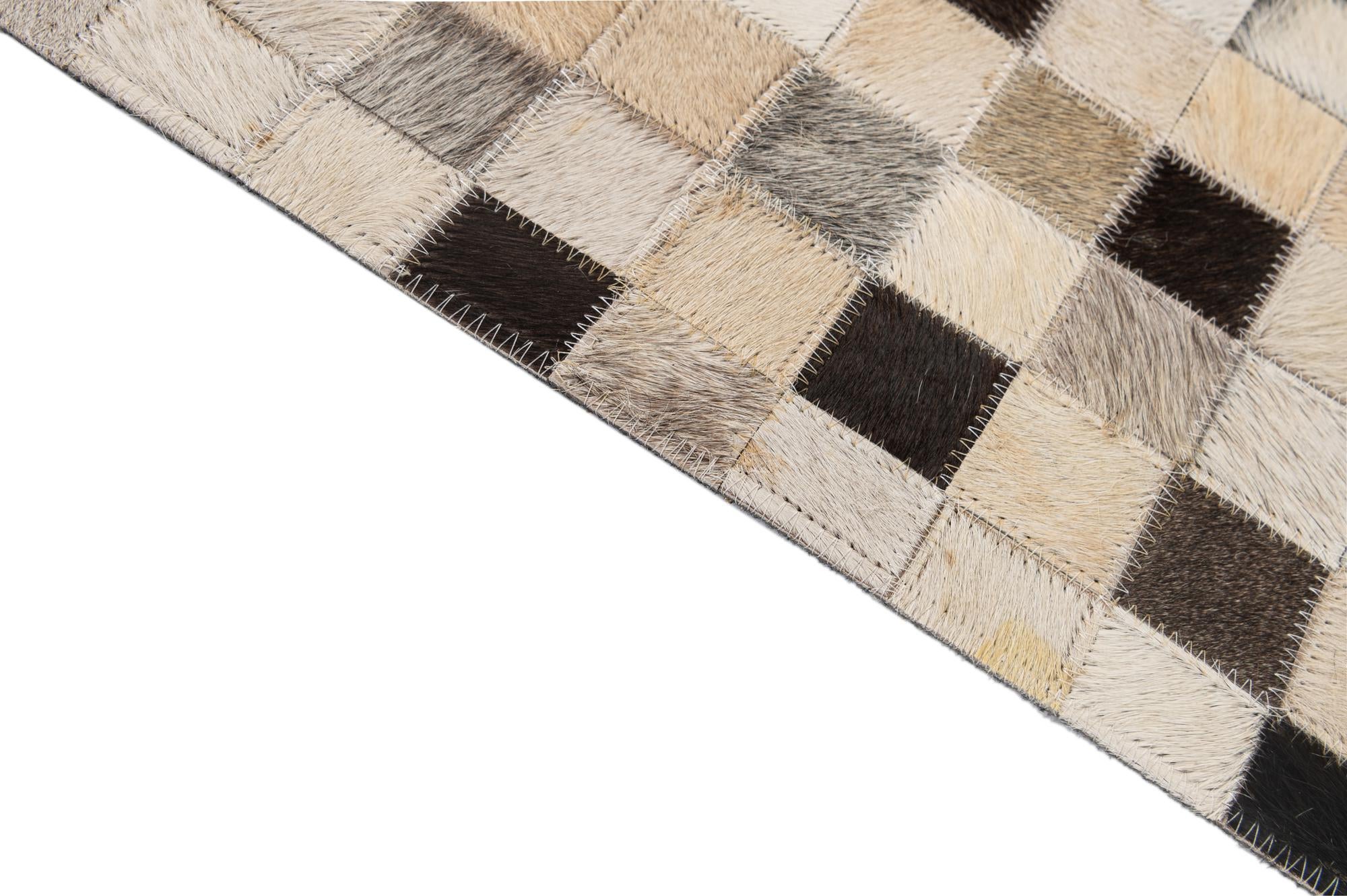 5' x 8' 2 Cowhide - Patchwork Rug