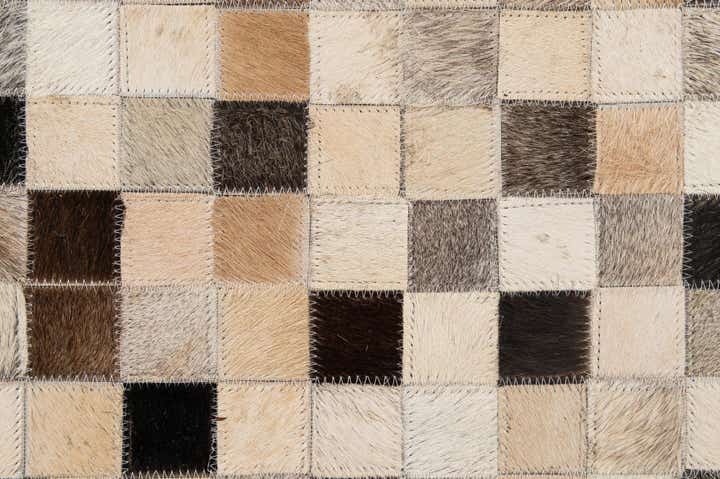 5' x 8' 2 Cowhide - Patchwork Rug