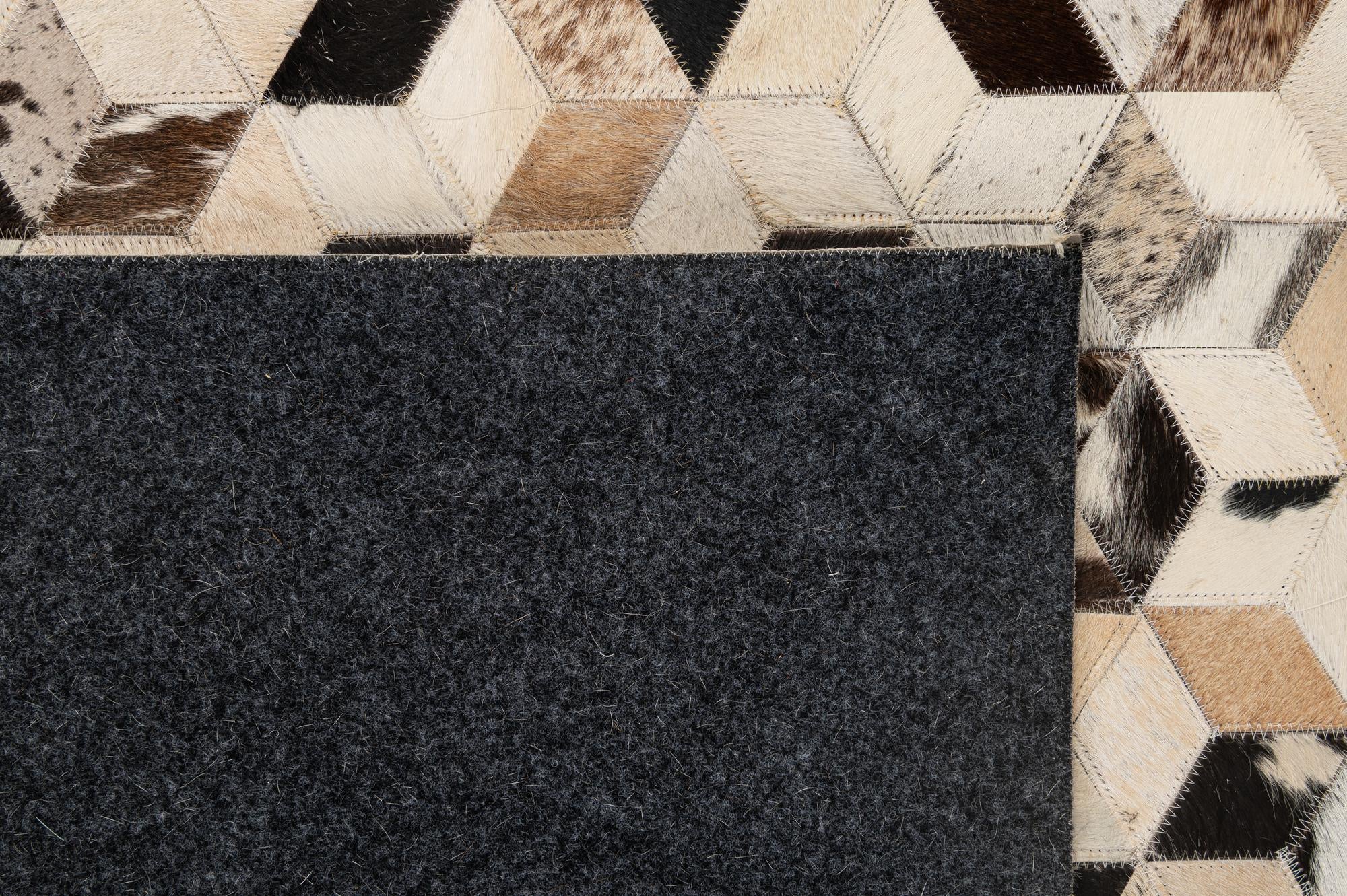 5' 1 x 7' 11 Cowhide - Patchwork Rug