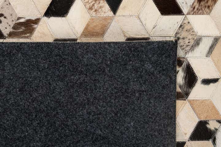 5' 1 x 7' 11 Cowhide - Patchwork Rug