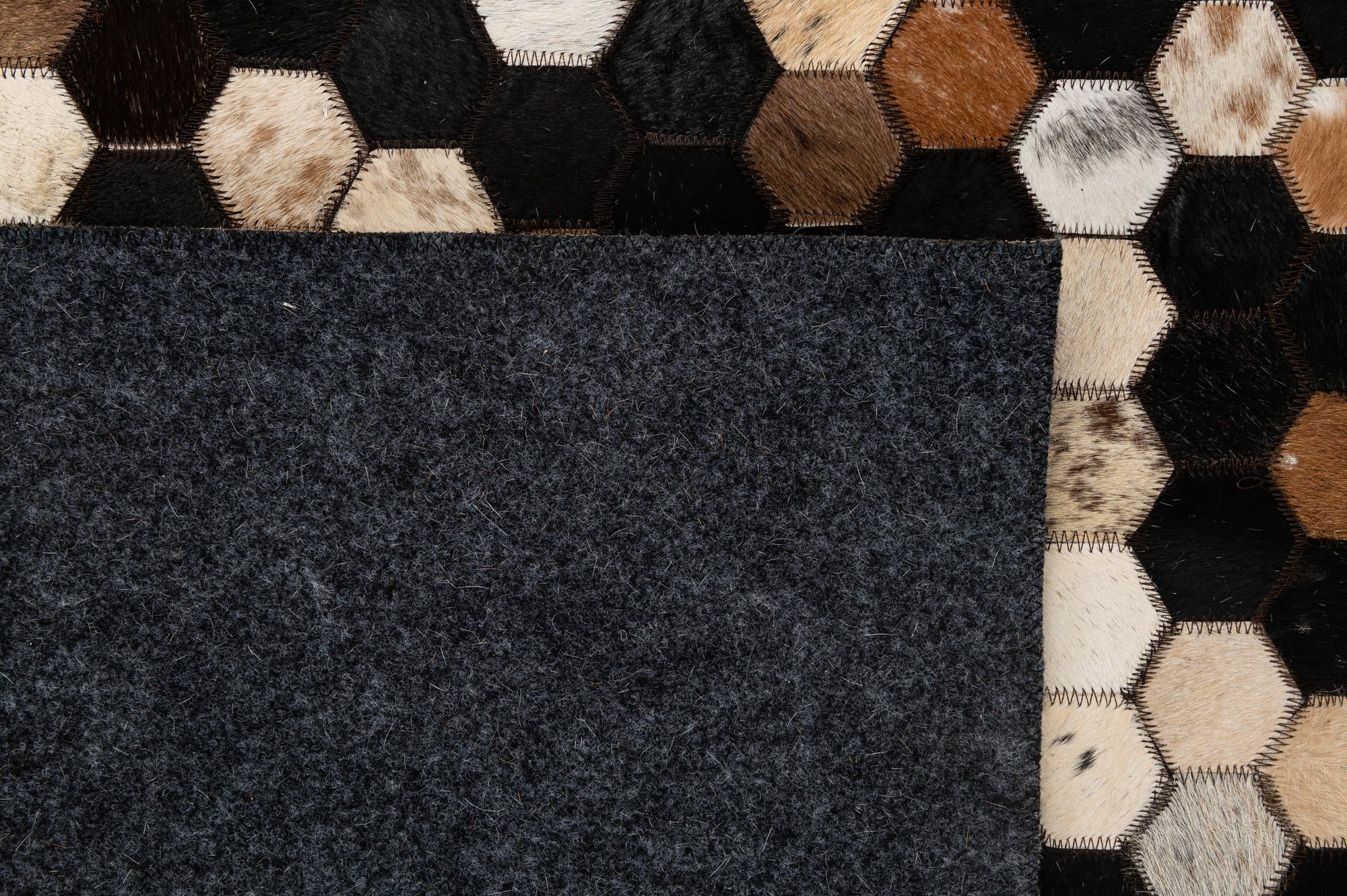 5' 2 x 8' 1 Cowhide - Patchwork Rug