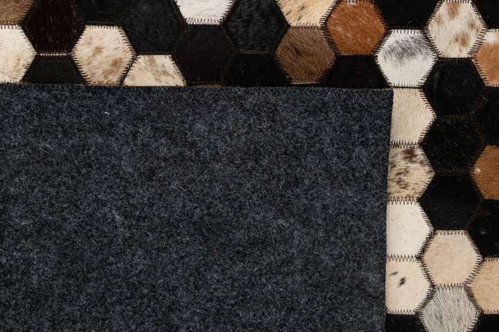 5' 2 x 8' 1 Cowhide - Patchwork Rug