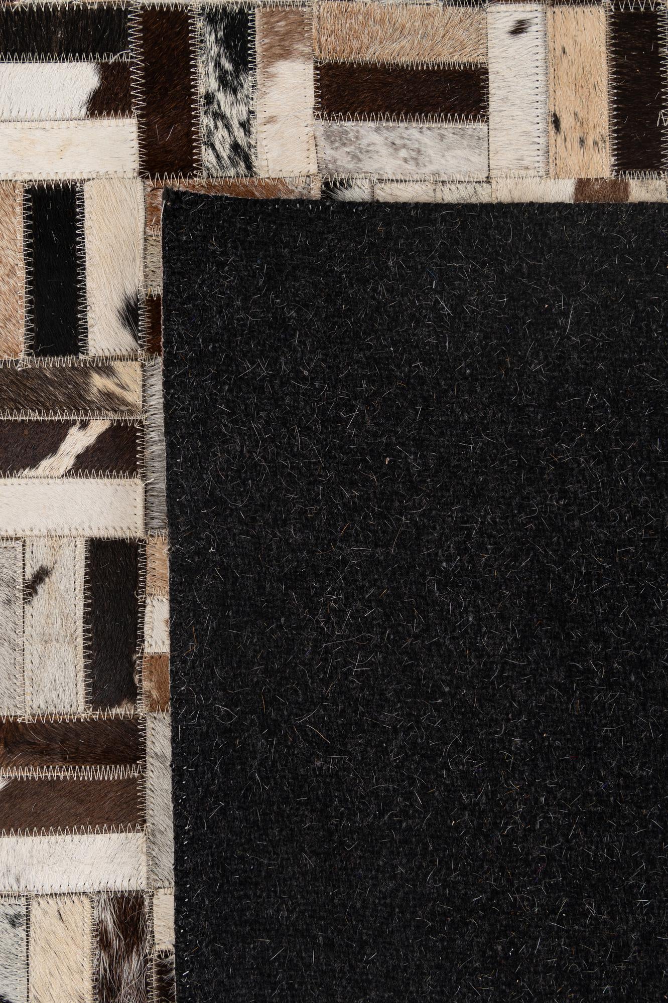 5' 1 x 8' Cowhide - Patchwork Rug