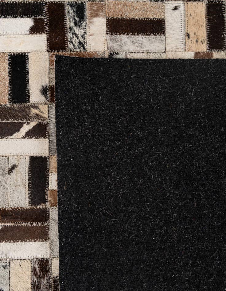 Detail image of 5' 1 x 8' Cowhide - Patchwork Rug