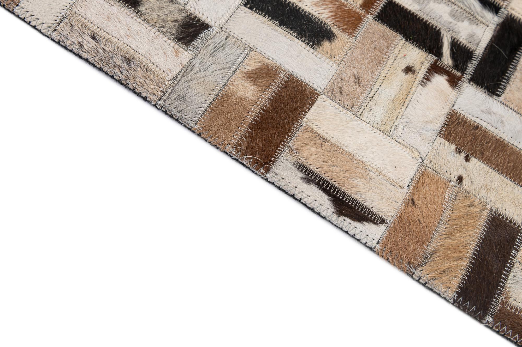 5' 1 x 8' 1 Cowhide - Patchwork Rug