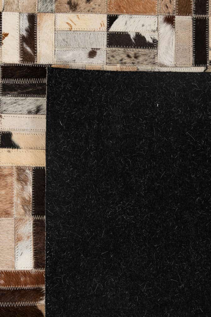5' x 7' 11 Cowhide - Patchwork Rug