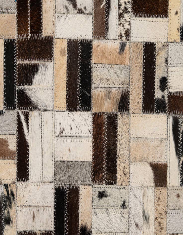 Detail image of 5' 1 x 8' Cowhide - Patchwork Rug