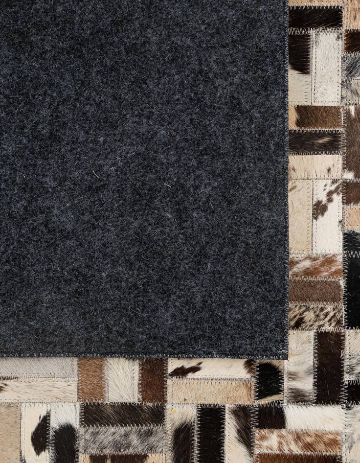 Detail image of 5' 1 x 8' Cowhide - Patchwork Rug