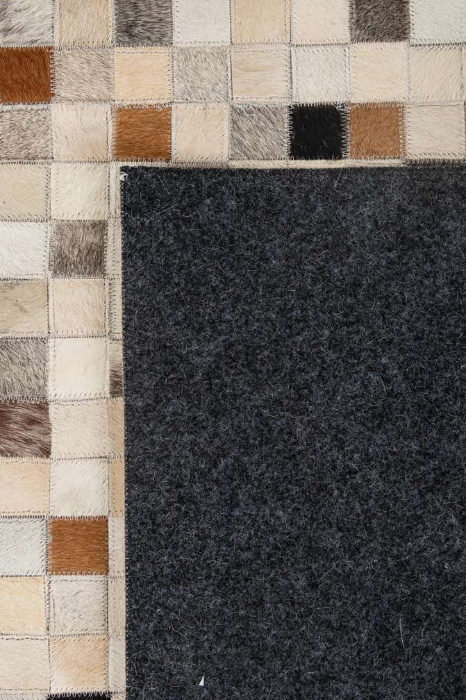 5' 1 x 7' 11 Cowhide - Patchwork Rug