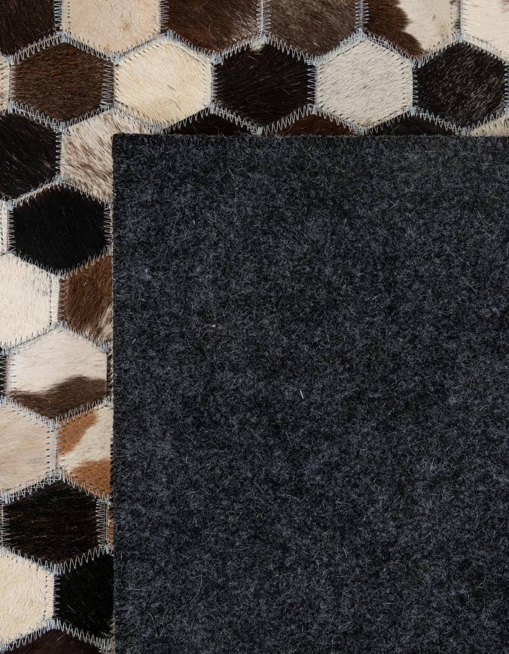 Detail image of 5' 1 x 8' Cowhide - Patchwork Rug