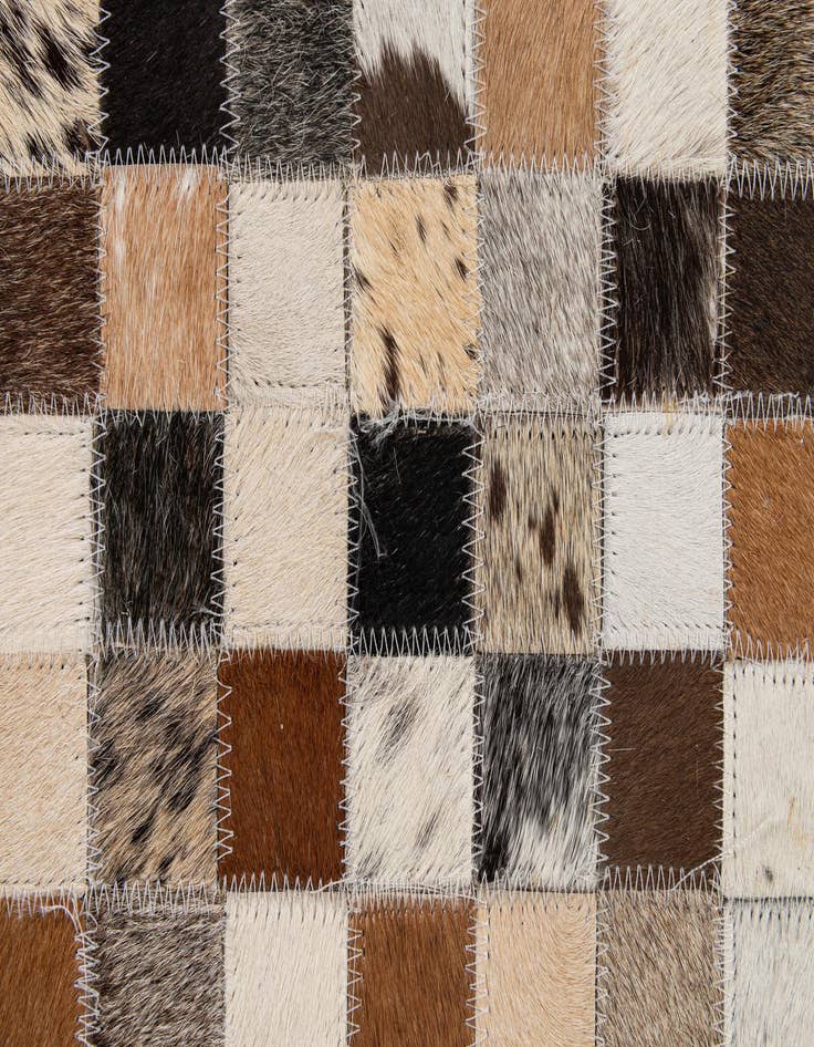 Detail image of 5' 1 x 7' 10 Cowhide - Patchwork Rug