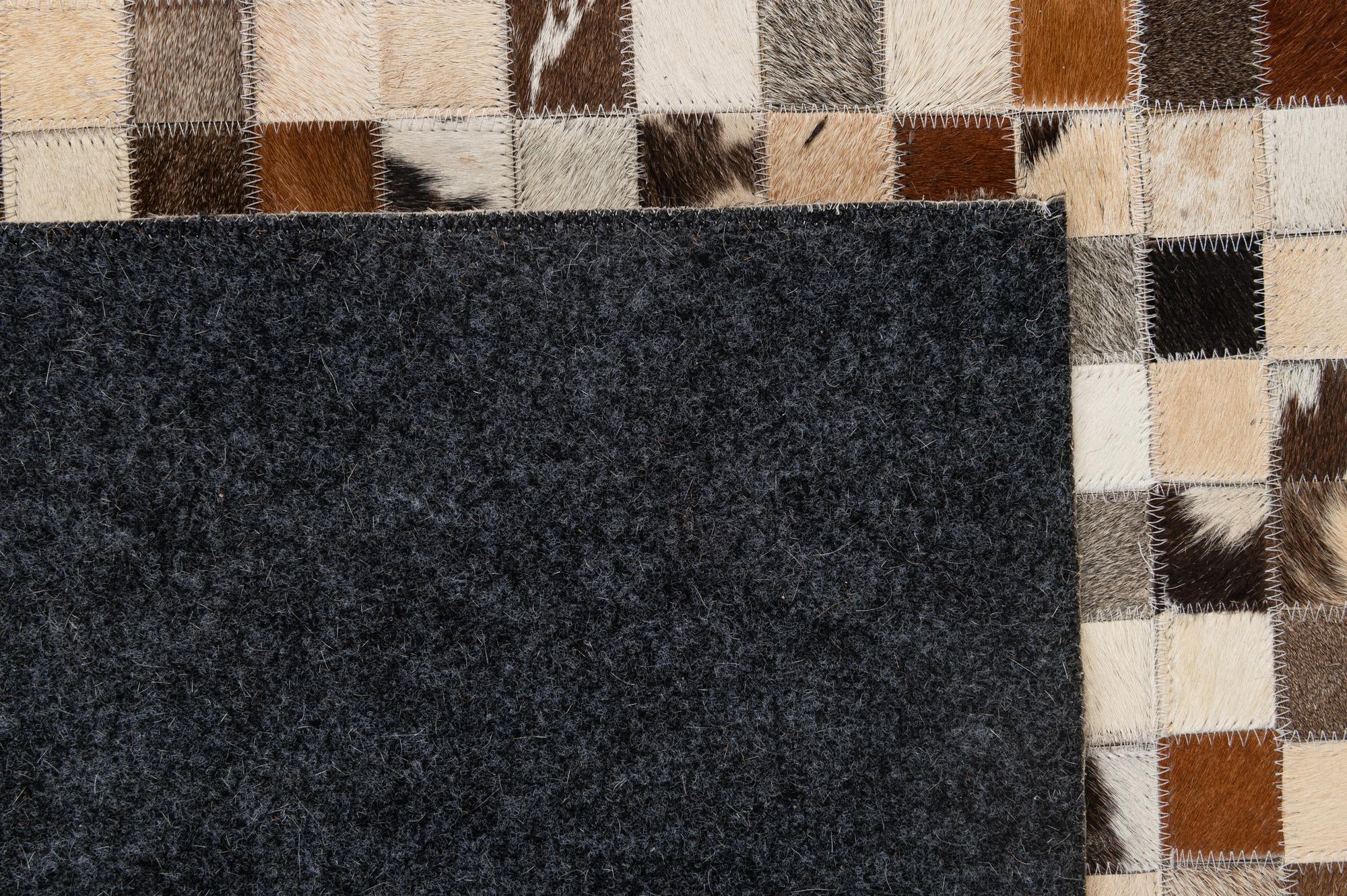 5' 1 x 7' 10 Cowhide - Patchwork Rug