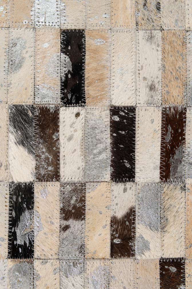 5' 2 x 7' 11 Cowhide - Patchwork Rug