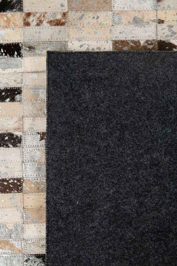 5' 2 x 7' 11 Cowhide - Patchwork Rug