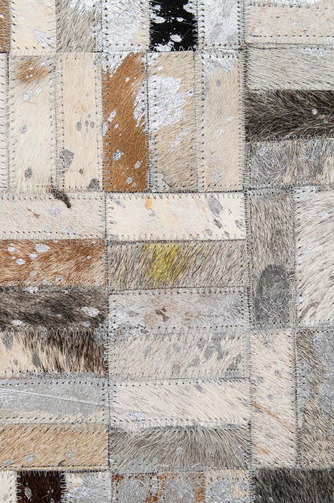 5' 2 x 8' 1 Cowhide - Patchwork Rug