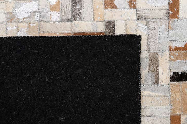 5' 2 x 8' 1 Cowhide - Patchwork Rug