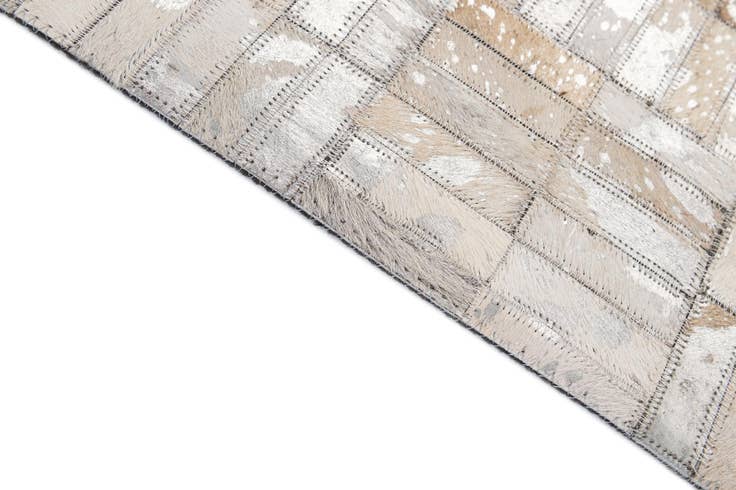 Detail image of 5' 1 x 7' 10 Cowhide - Patchwork Rug
