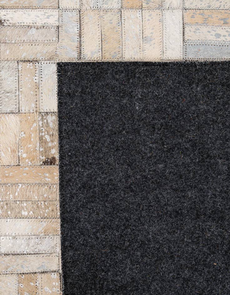 Detail image of 5' 1 x 7' 10 Cowhide - Patchwork Rug