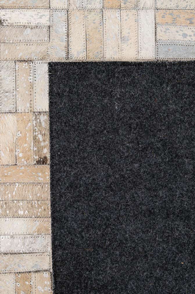 5' 1 x 7' 10 Cowhide - Patchwork Rug