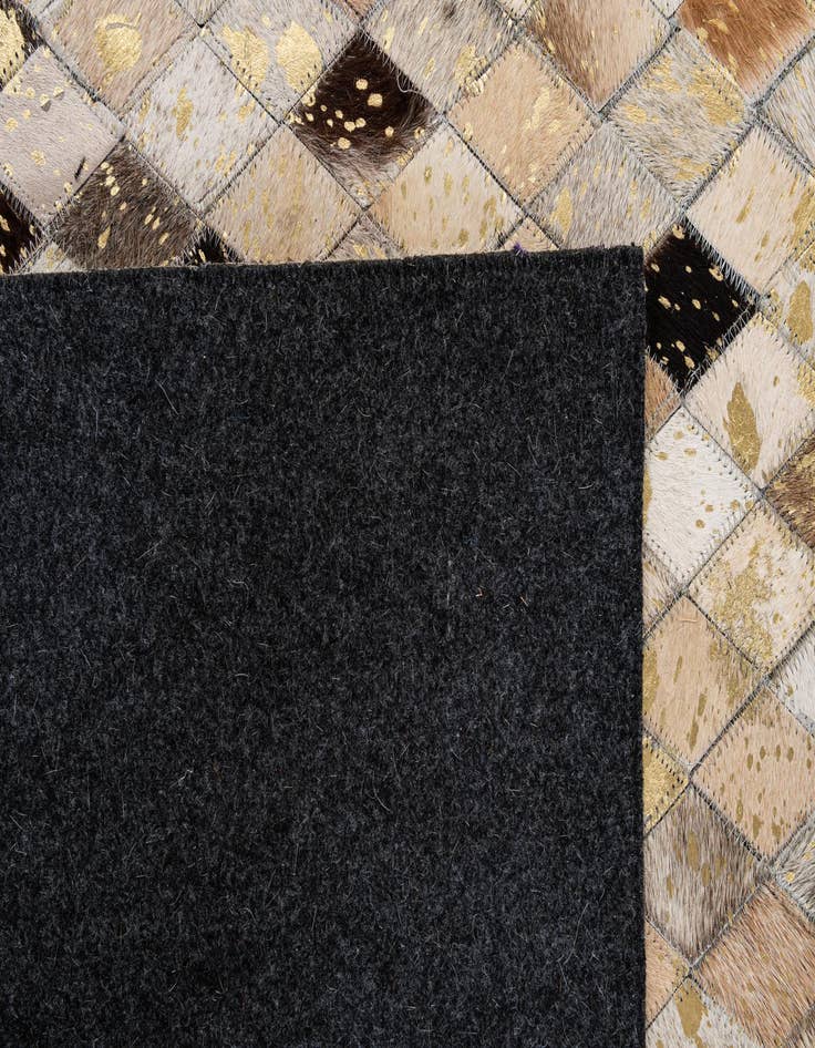 Detail image of 5' 1 x 7' 11 Cowhide - Patchwork Rug