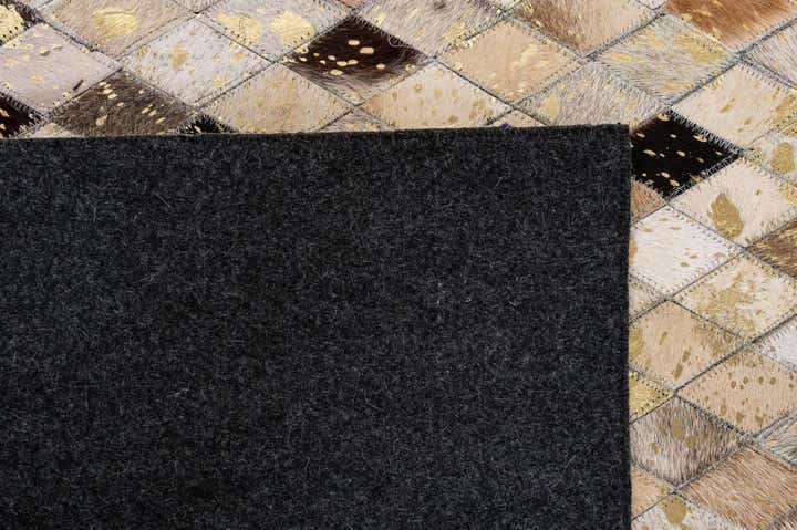 5' 1 x 7' 11 Cowhide - Patchwork Rug