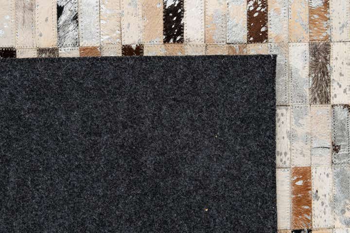 5' x 7' 11 Cowhide - Patchwork Rug