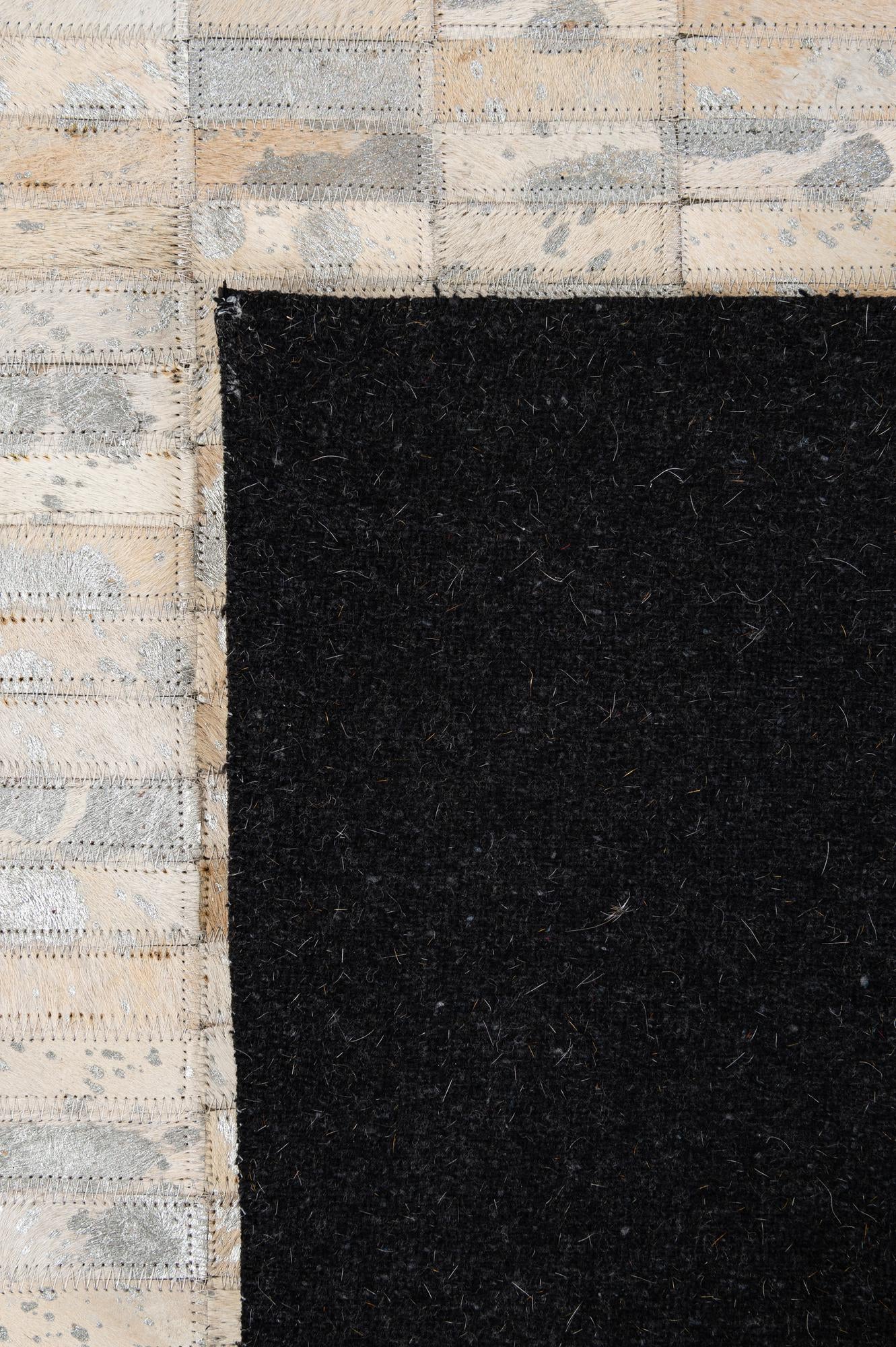 4' 11 x 7' 11 Cowhide - Patchwork Rug