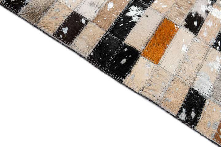 5' 2 x 8' 1 Cowhide - Patchwork Rug