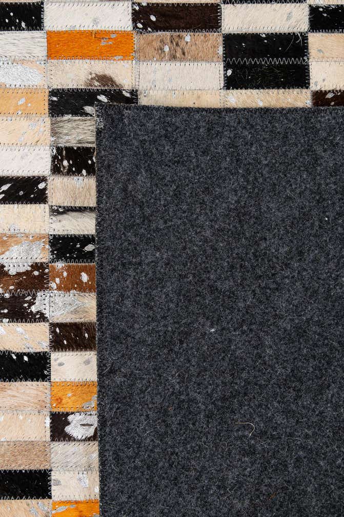 5' 2 x 8' 1 Cowhide - Patchwork Rug