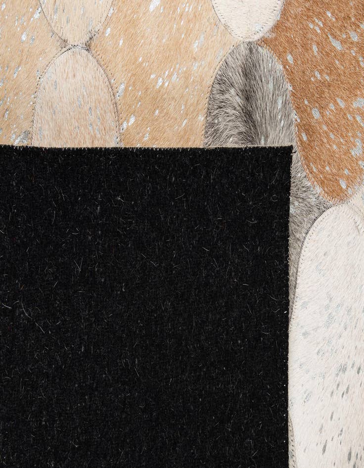 Detail image of 5' 1 x 8' 4 Cowhide - Patchwork Rug