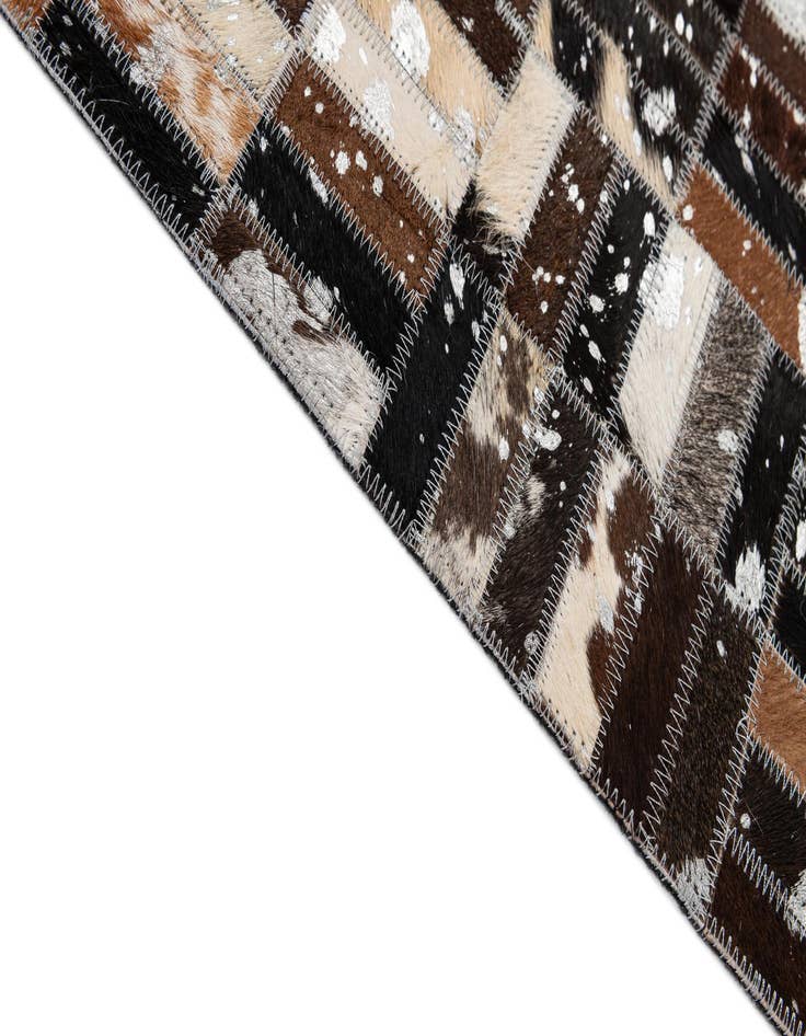 Detail image of 4' 11 x 7' 10 Cowhide - Patchwork Rug