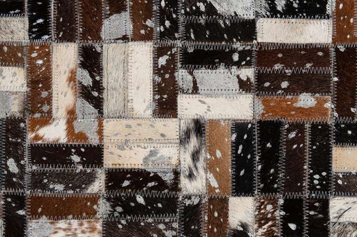 4' 11 x 7' 10 Cowhide - Patchwork Rug