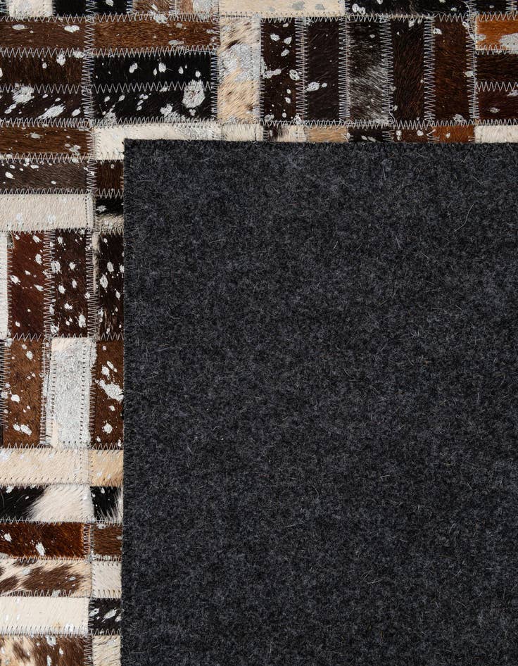 Detail image of 4' 11 x 7' 10 Cowhide - Patchwork Rug