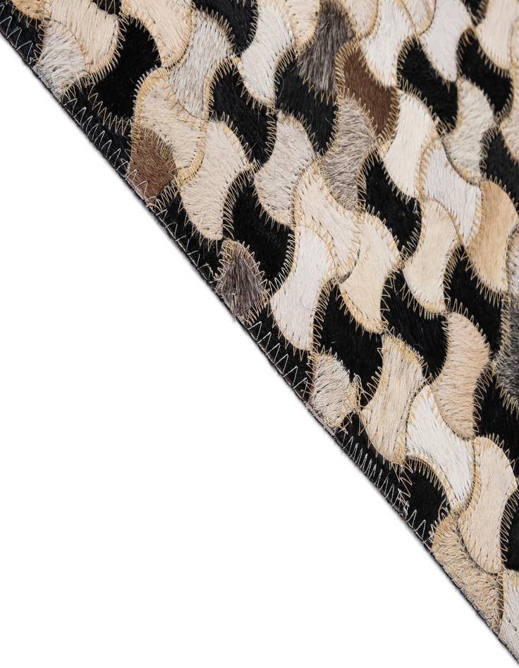 Detail image of 5' 1 x 8' 1 Cowhide - Patchwork Rug