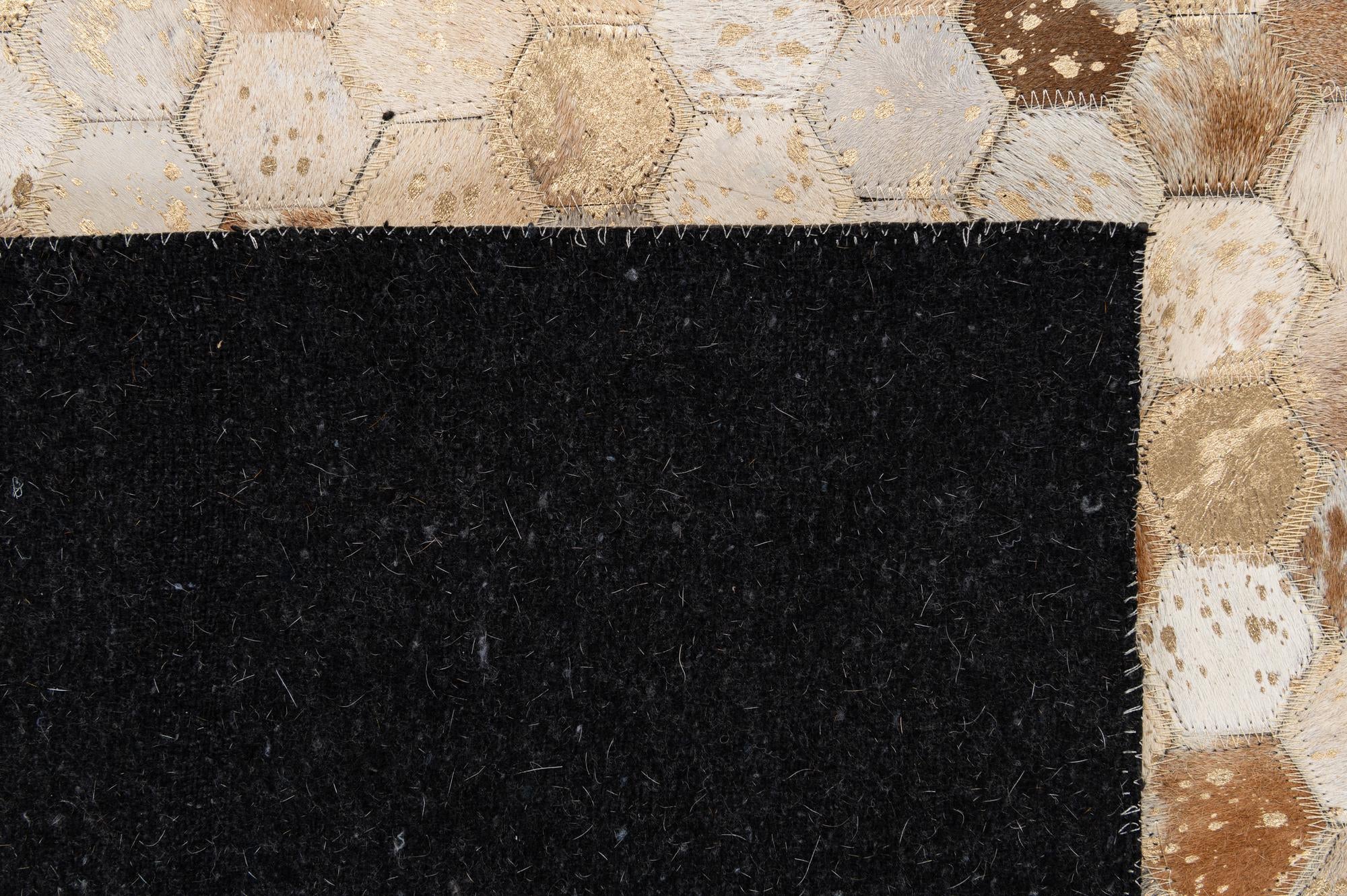 5' 2 x 8' 2 Cowhide - Patchwork Rug