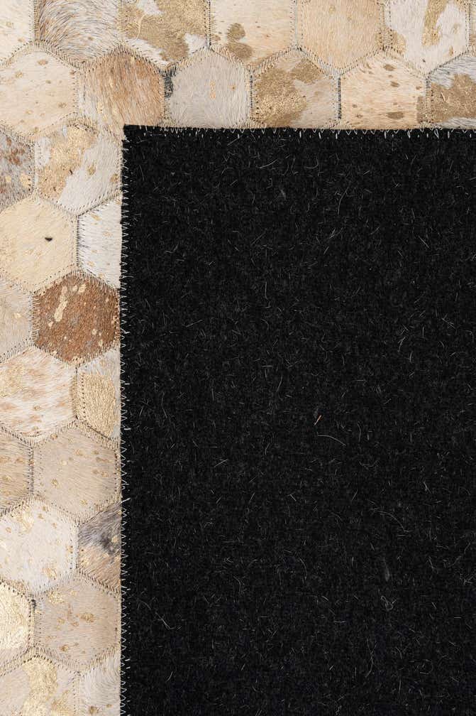 5' 2 x 8' 3 Cowhide - Patchwork Rug