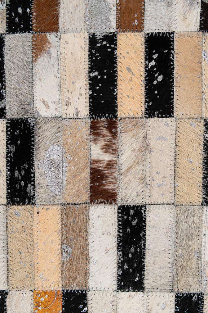 5' x 8' 2 Cowhide - Patchwork Rug