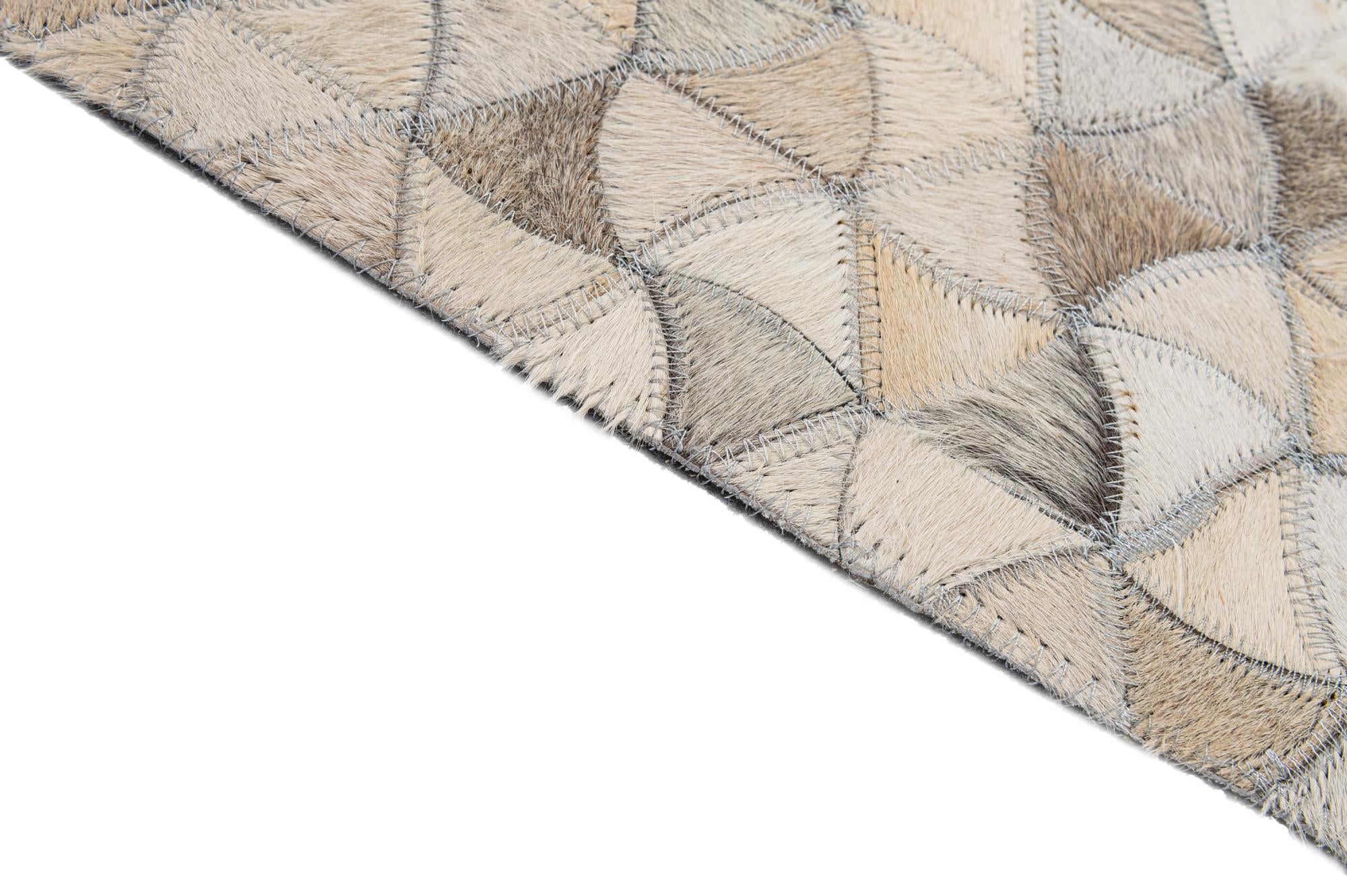 4' 11 x 8' Cowhide - Patchwork Rug