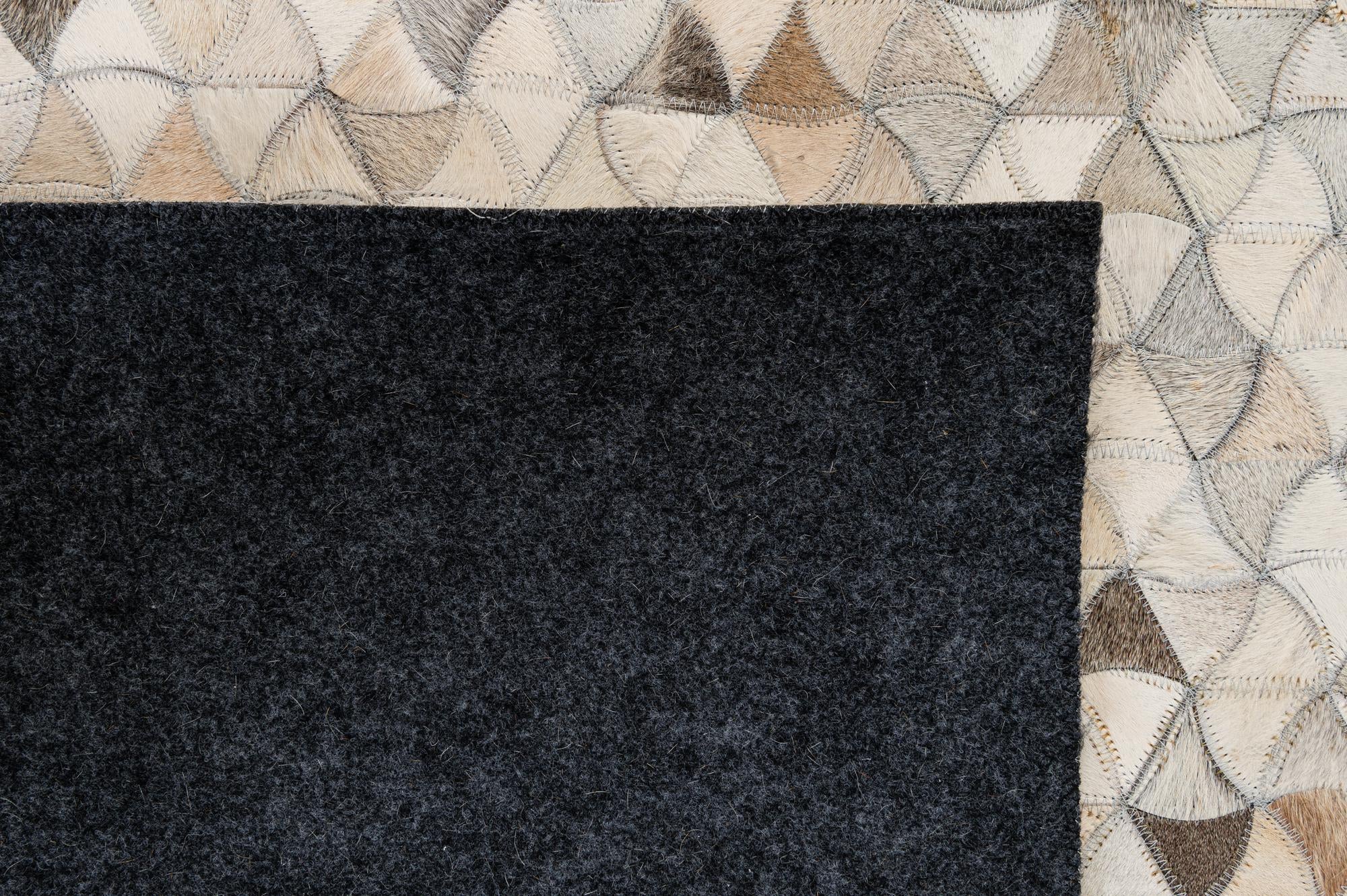 4' 11 x 8' Cowhide - Patchwork Rug