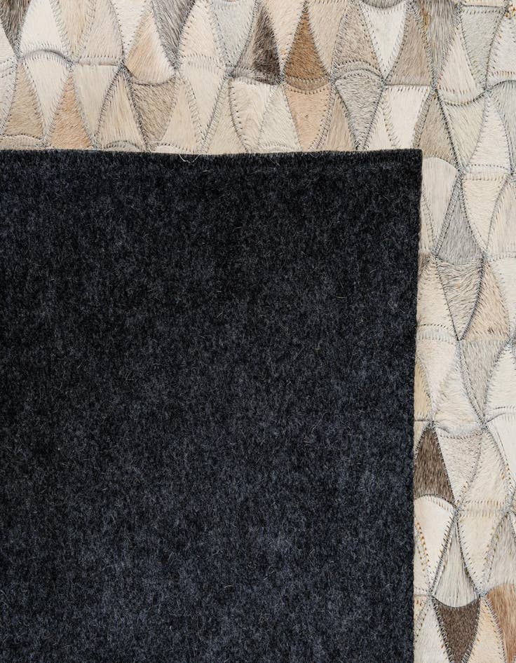 Detail image of 4' 11 x 8' Cowhide - Patchwork Rug