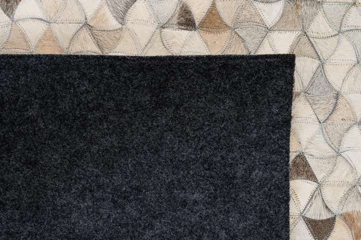 4' 11 x 8' Cowhide - Patchwork Rug