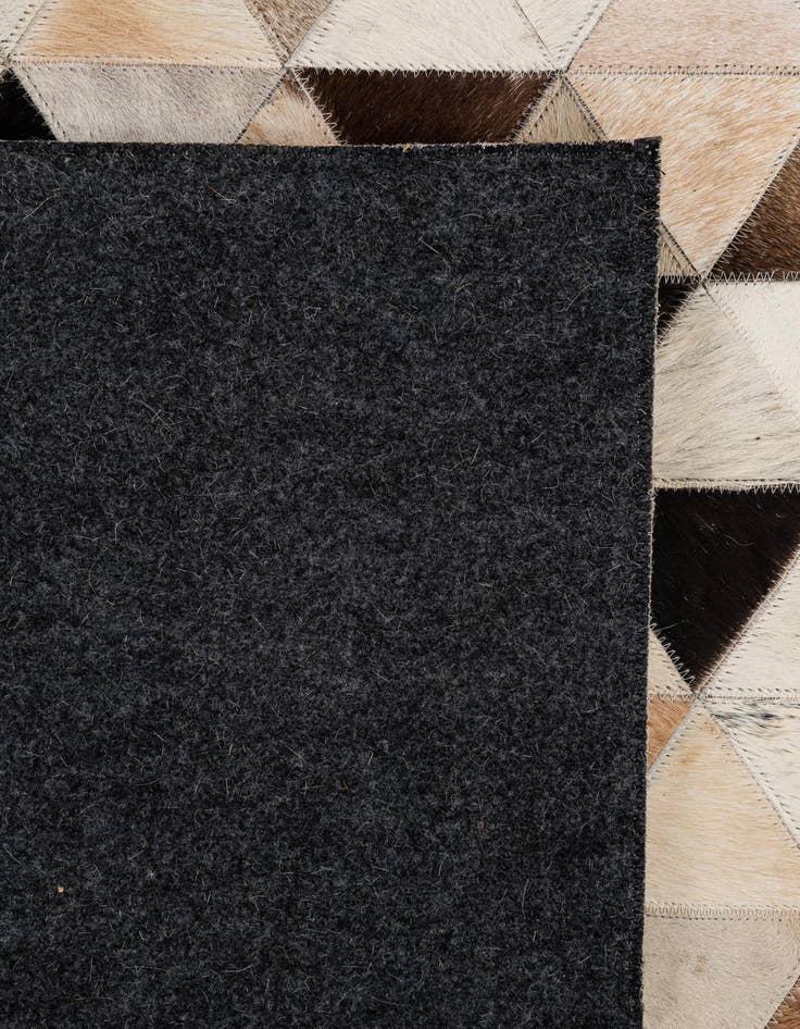 Detail image of 5' x 8' Cowhide - Patchwork Rug